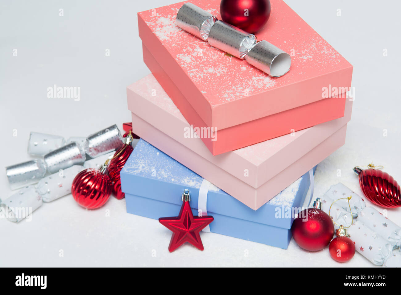 Luxury Christmas gifts in boxes with festive decorations Stock Photo