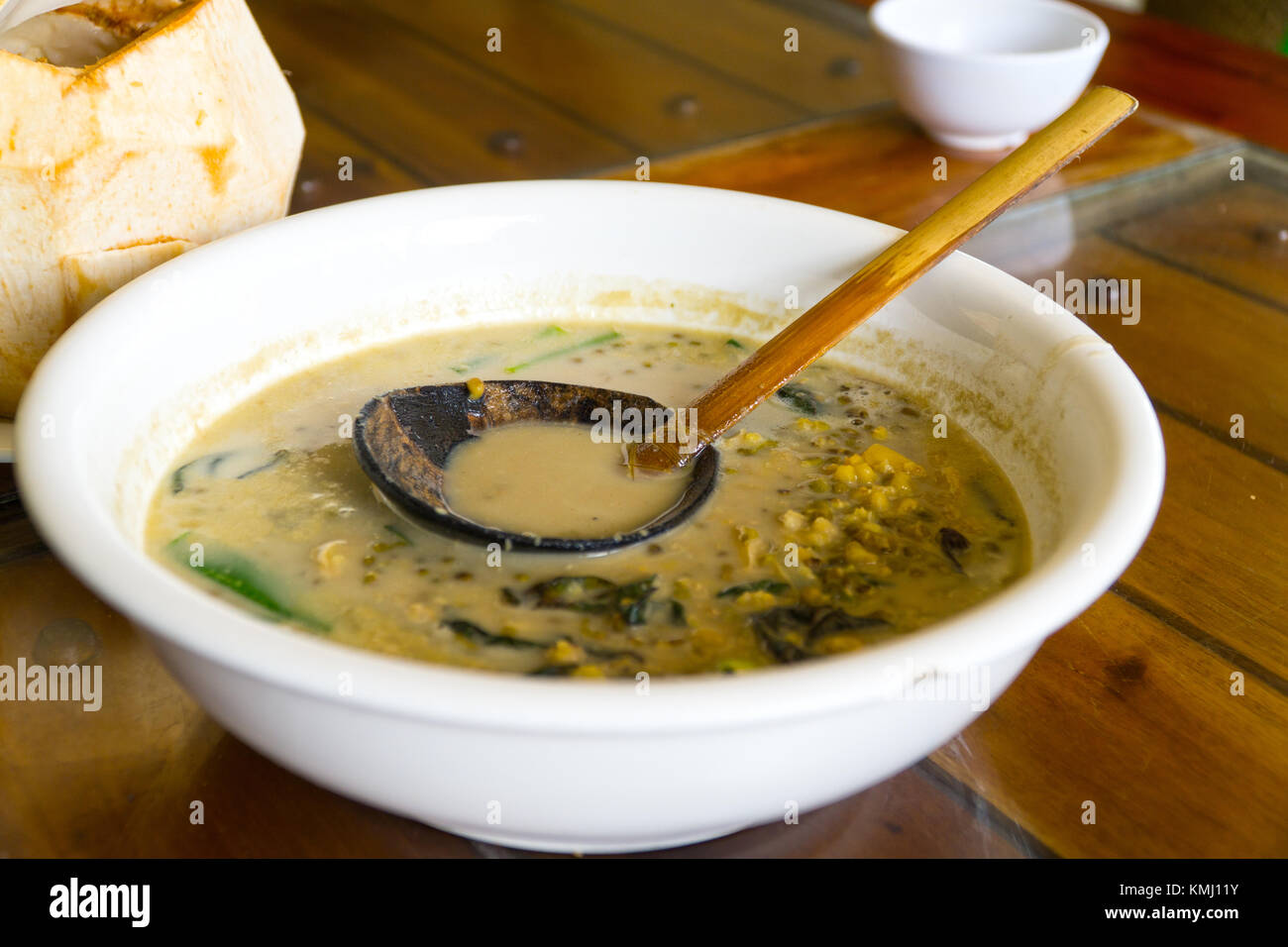 A bowl of Ginisang Munggo soup - a common traditional dish served in the Philippines. Stock Photo