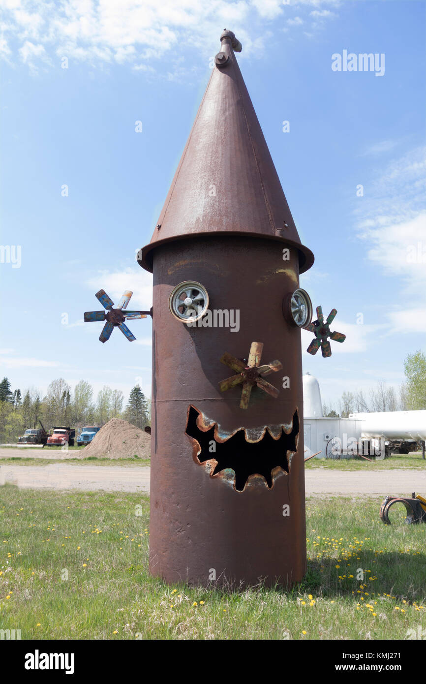 Happy roadside sculpture made from culverts, grain bins and vehicle parts. Foley Minnesota MN USA Stock Photo