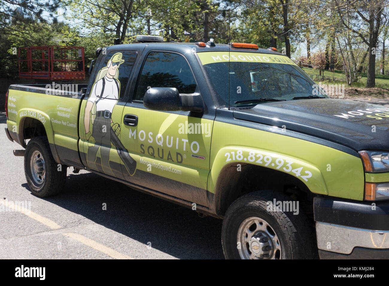 Pickup truck vehicle for the Mosquito Squad outdoor bug exterminators. Nisswa Minnesota MN USA Stock Photo