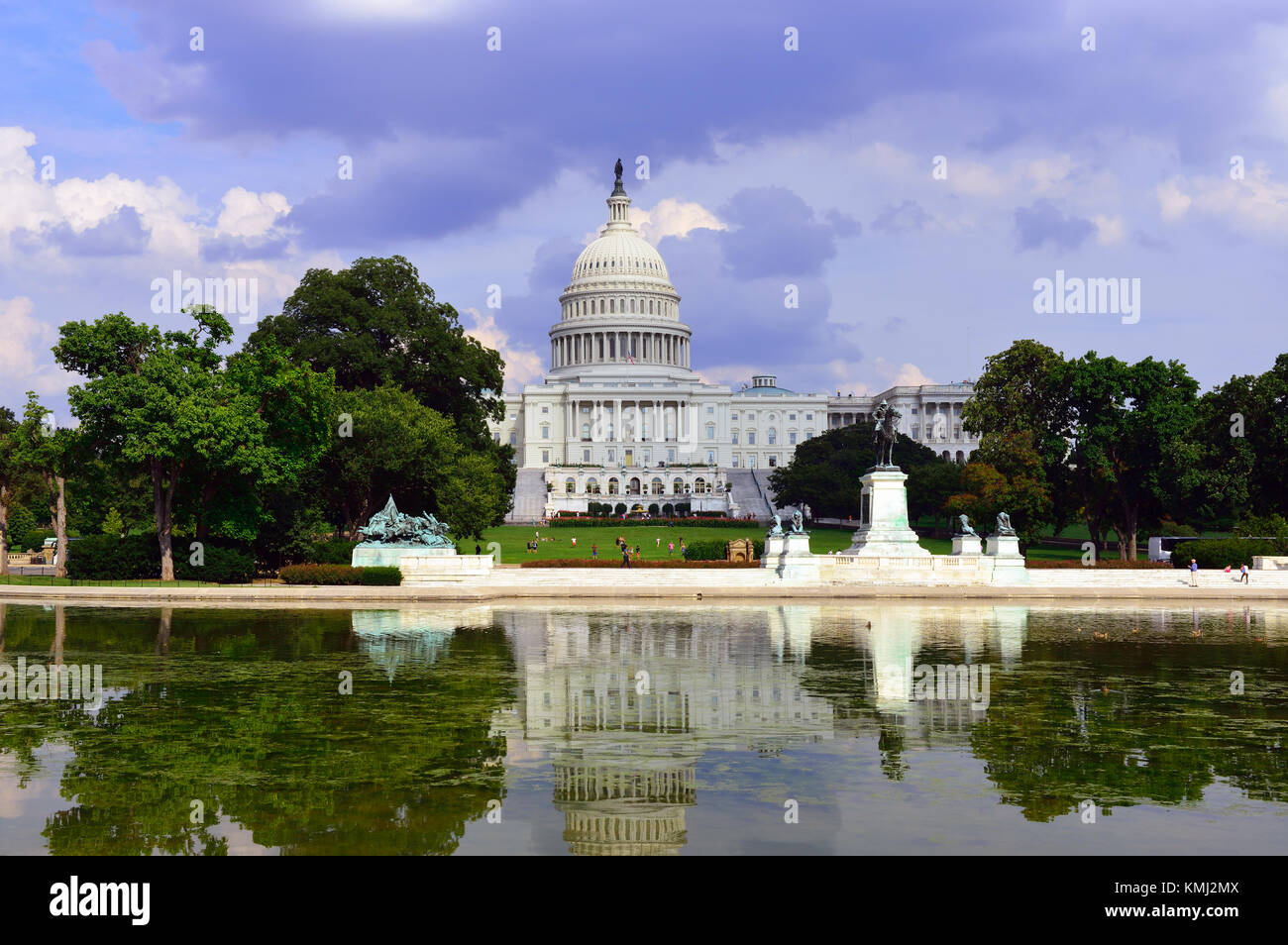Congress building in Capitol Hill, Washington DC with stormy sky and water reflections. Stock Photo