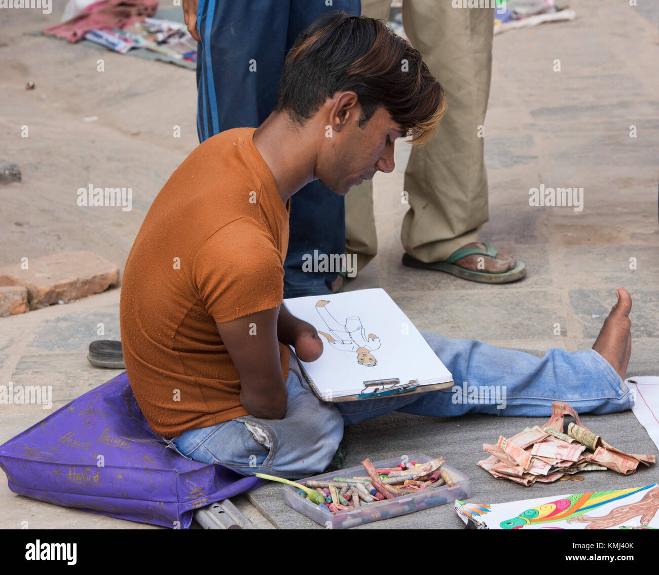 Disabled street artist sketching, Kathmandu, Nepal Stock Photo