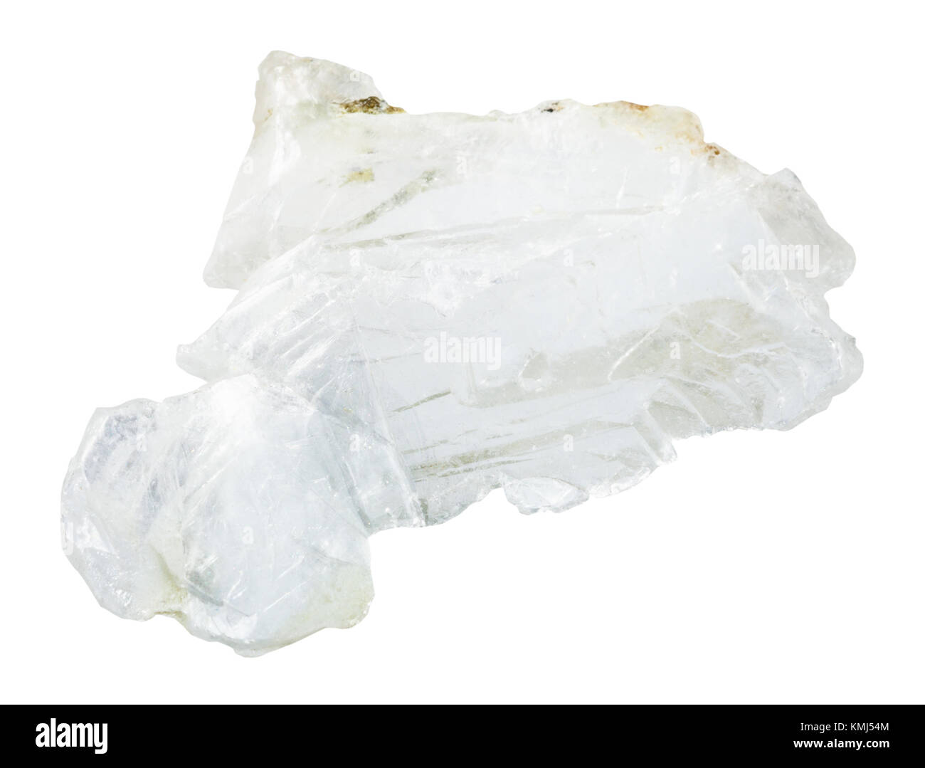 macro shooting of natural mineral rock specimen - rough layer of Brucite stone (Magnesium oxide ore) isolated on white background from Sverdlovsk Regi Stock Photo