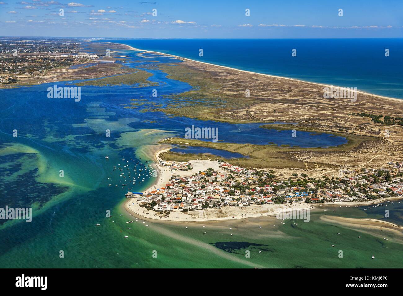 Armona island. In the background Olhao and Ria Formosa, natural Stock