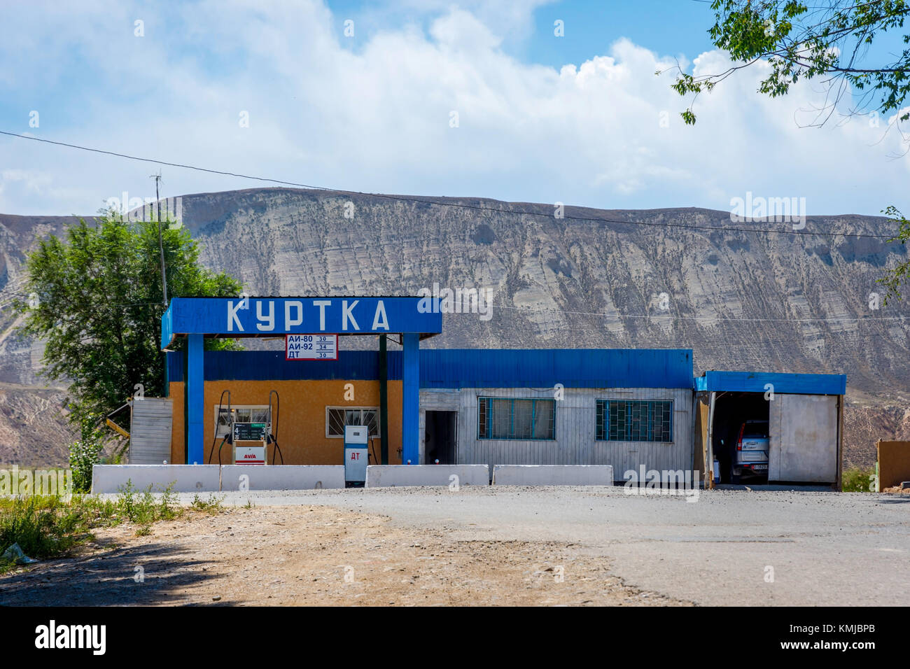AK-TAL, KYRGYZSTAN - AUGUST 14: Gas station in a remote kyrgyz village on local road. August 2016 Stock Photo