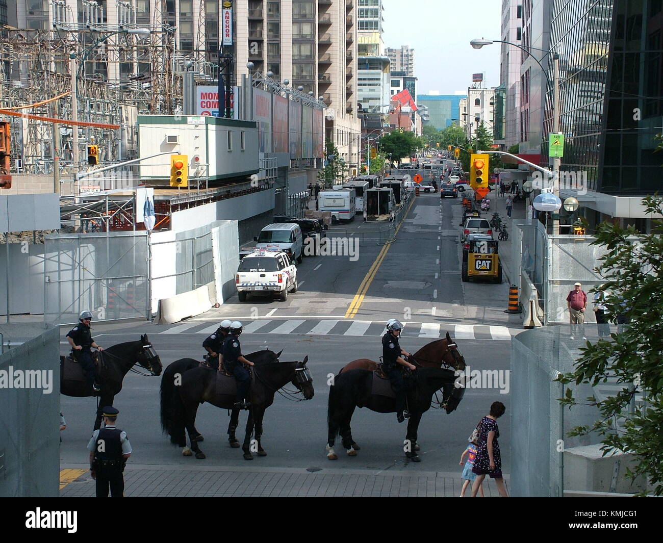 TORONTO - JUNE 23, 2010 - Police officers marching on the streets on horses during G20 Protest in Toronto, Ontario, Canada. Stock Photo