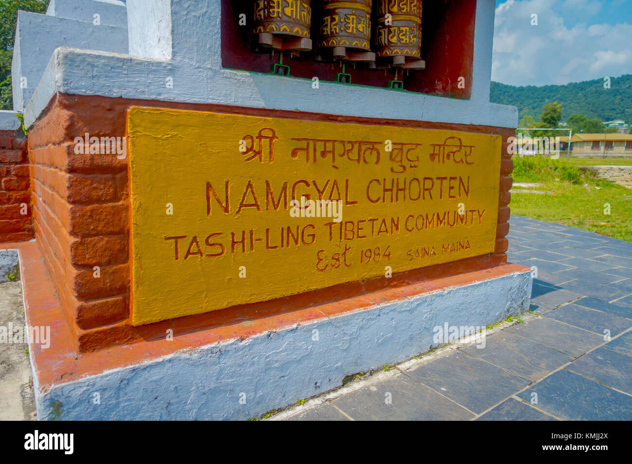 POKHARA, NEPAL - OCTOBER 06 2017: Informative sign written over a stoned structure at outdoors, in Pokhara, Nepal Stock Photo