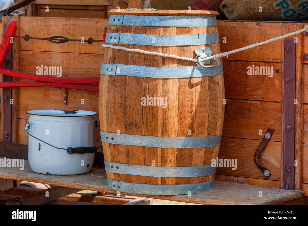 McMinnville, Oregon, USA - August 13, 2016:  Close up of a barrell tied to the side of a wooden wagon sitting on display at the Yamhill County Harvest Stock Photo