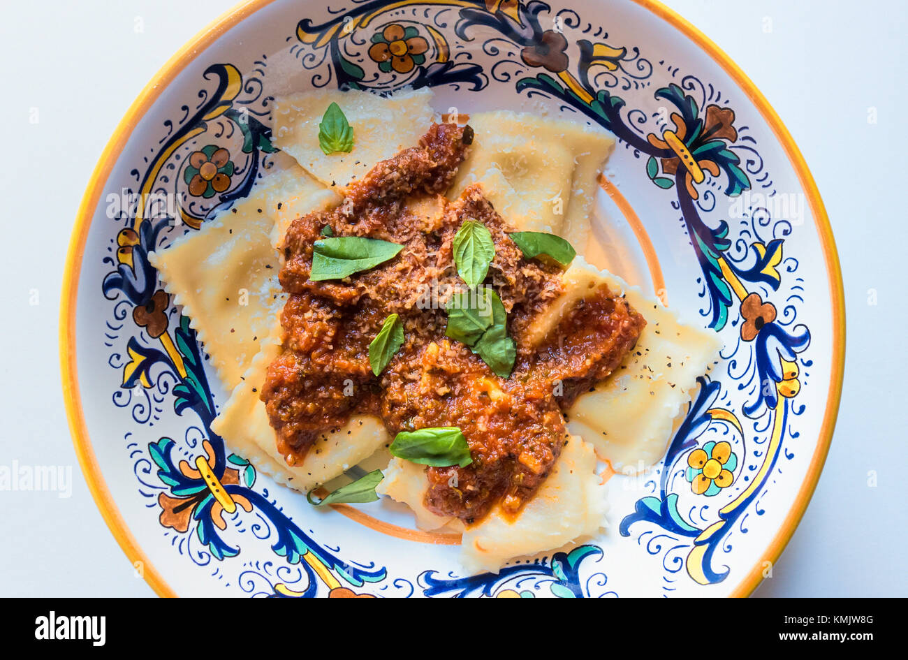 Ravioli stuffed with goat cheese, with a tomato sauce, Parmigano