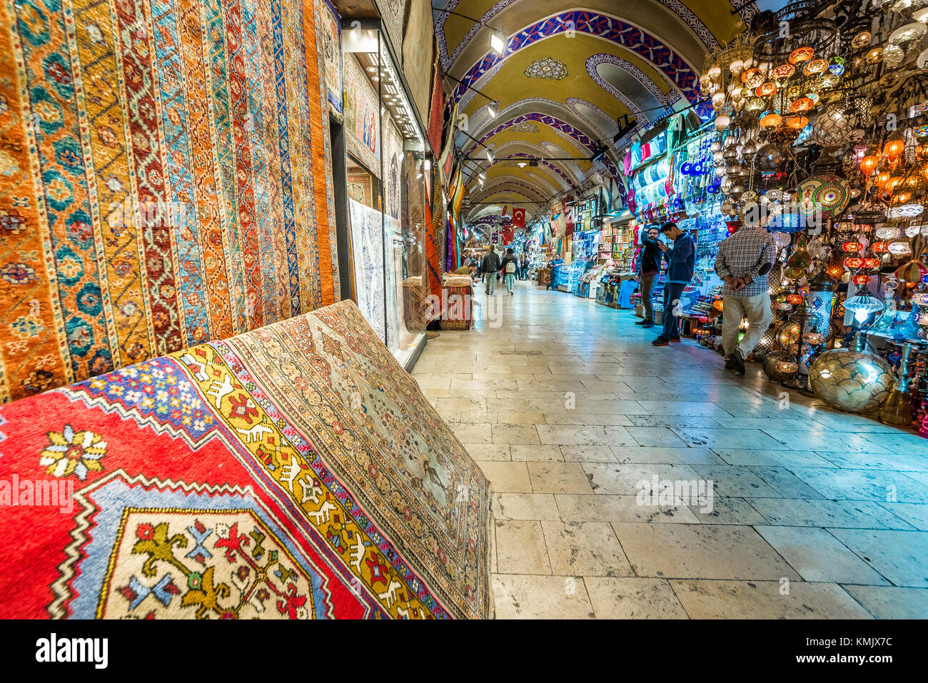 Unidentified people visiting the Grand Bazaar for shopping,Turkish rug