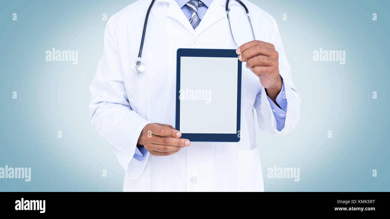 A doctor showing digital tablet on white background Stock Photo