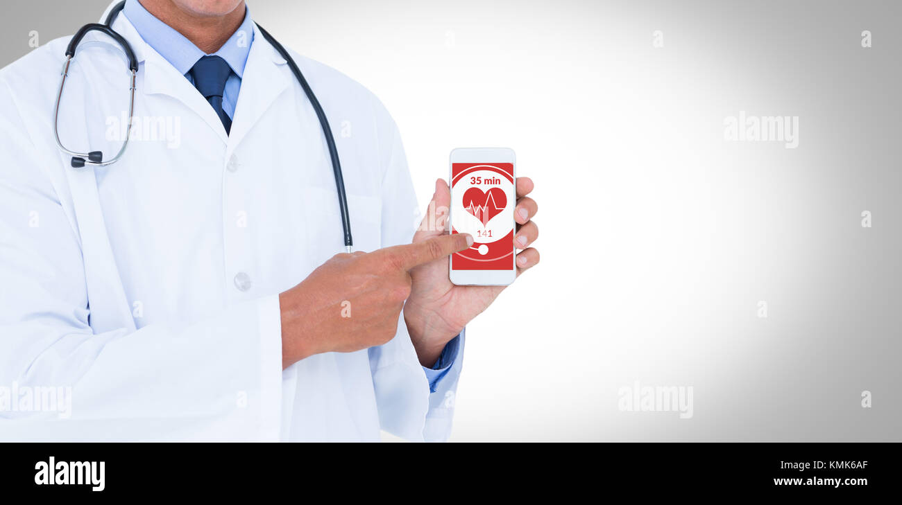 Midsection of male doctor pointing on mobile phone against digital composite of heart icon Stock Photo