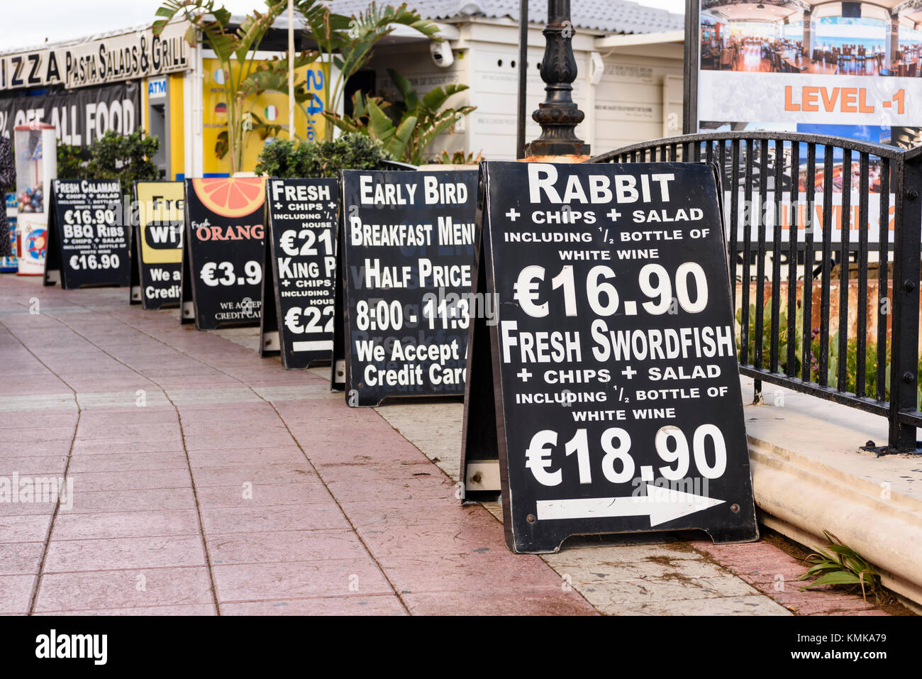 A-boards advertising food including rabbit and swordfish outside a restaurant in Malta. Stock Photo