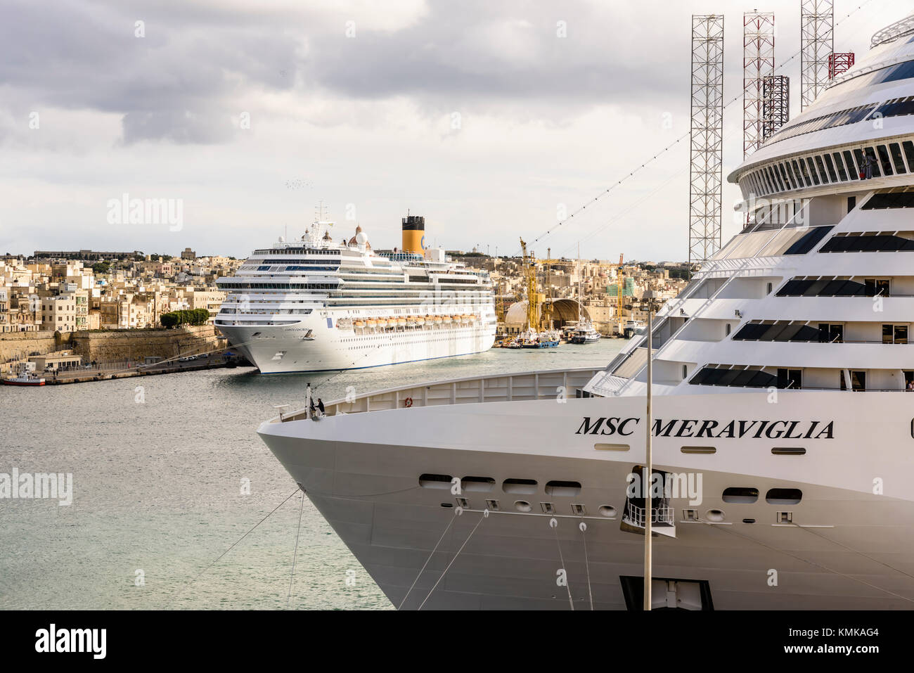 Cruise liner ships MSC Meraviglia and Costa Fascinosa in Valletta Harbour, Malta Stock Photo