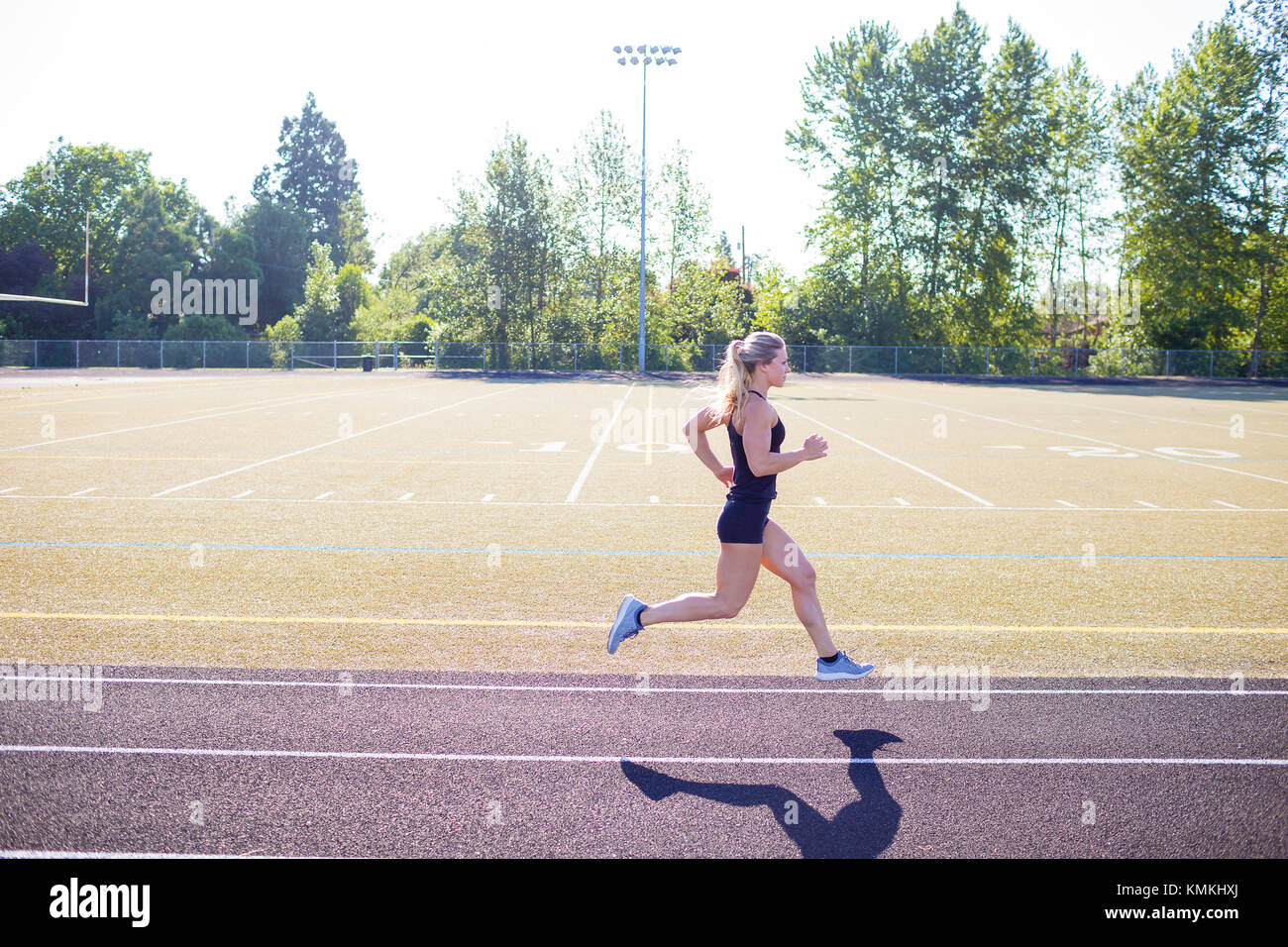 Working Out Track Young Female Athlete Working Out on Track Stock Photo - Alamy