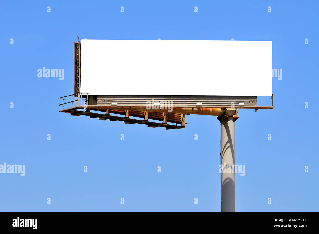 Large billboard and clear blue sky. Outdoor advertising template with clipping path included. Stock Photo