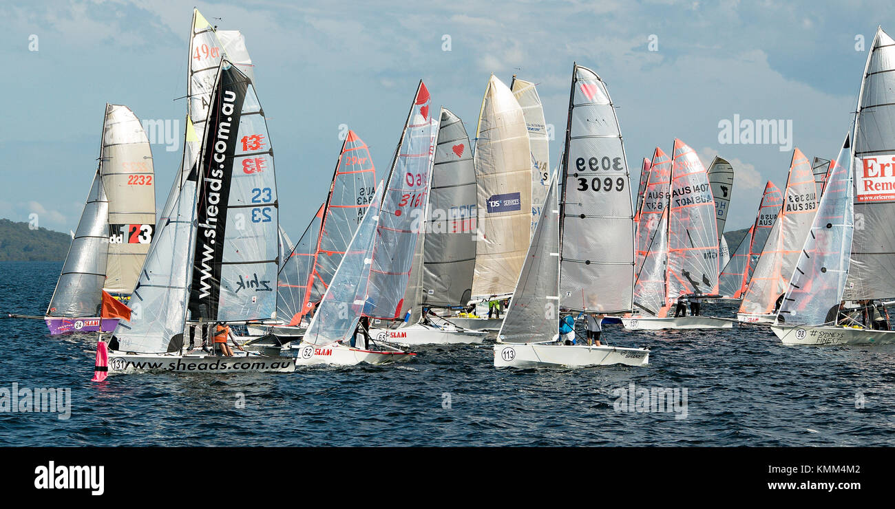 Children Sailing Regatta. High school children competing successfully in a colourful action packed sailing regatta over several days of racing . Stock Photo