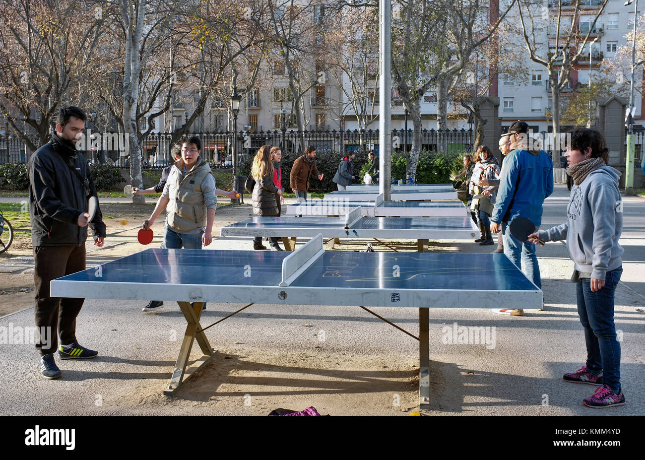 People play table tennis on free tables in Parc Cuitadella, Barcelona,  Spain Stock Photo - Alamy