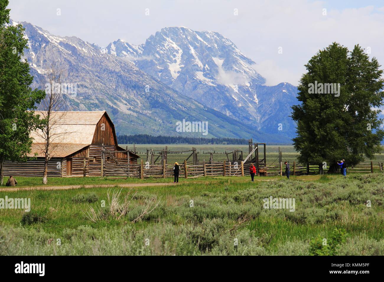 Tourists visit the T. A. Moulton Barn at the Grand Teton National Park ...