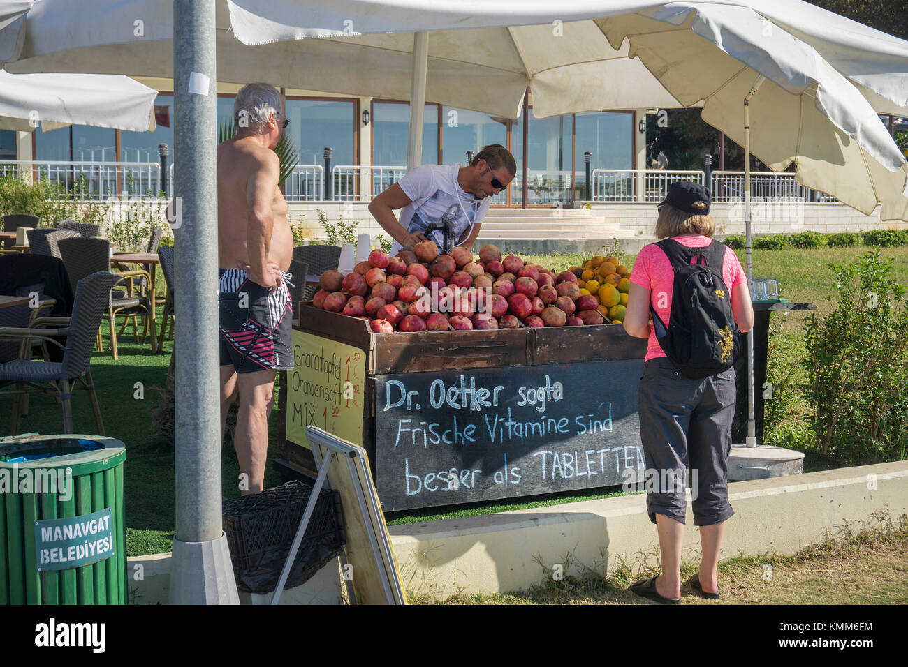 Freh fruit juice made of pomegranate (Punica granatum), street stall at beach promenade, Side, turkish riviera, Turkey Stock Photo