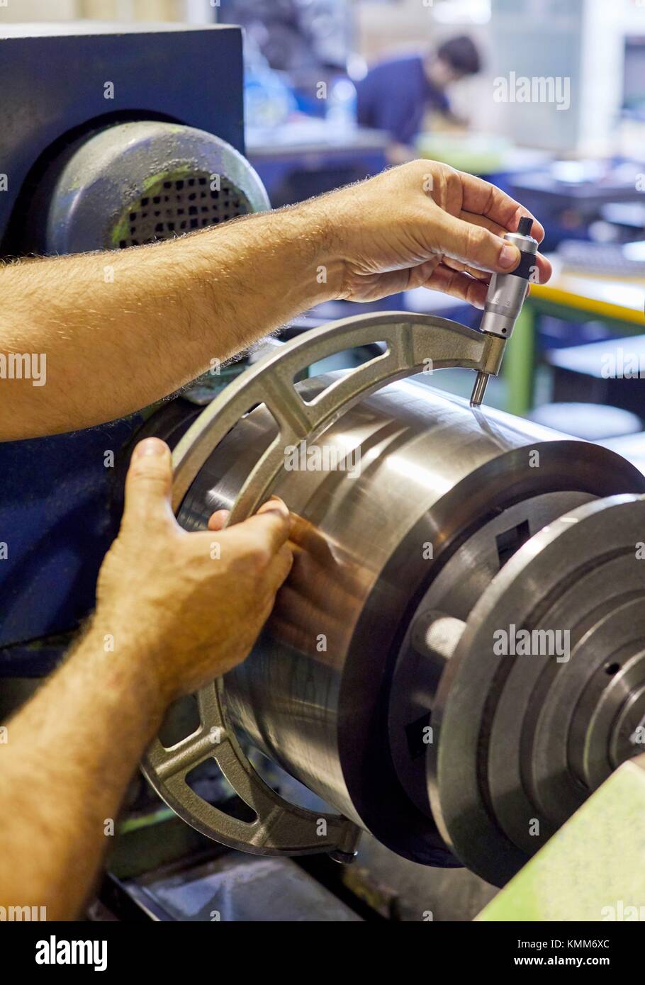 Quality control technician, Checking the measurement with micrometer