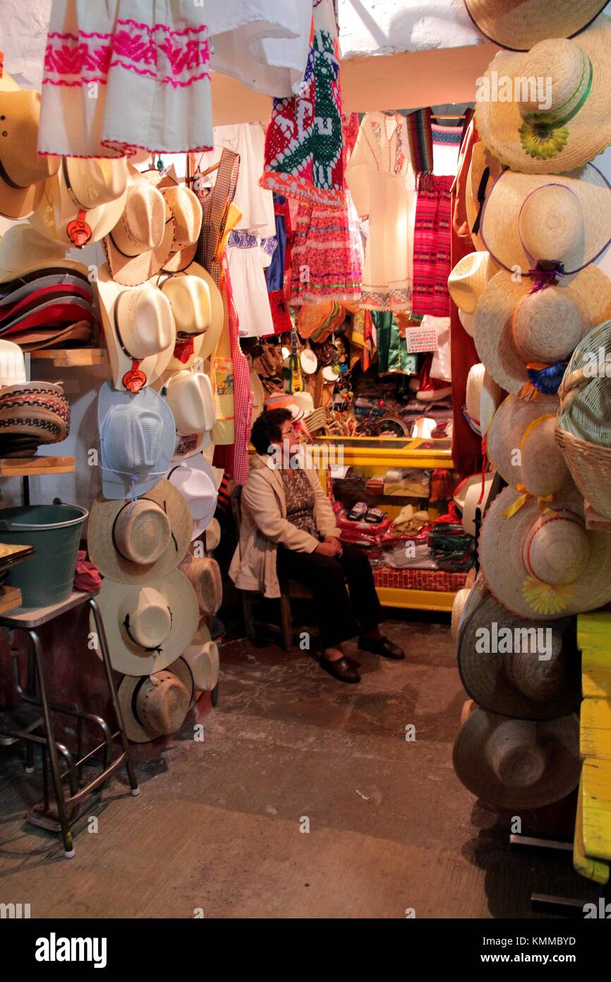 Hat seller on a Mexican market. Stock Photo