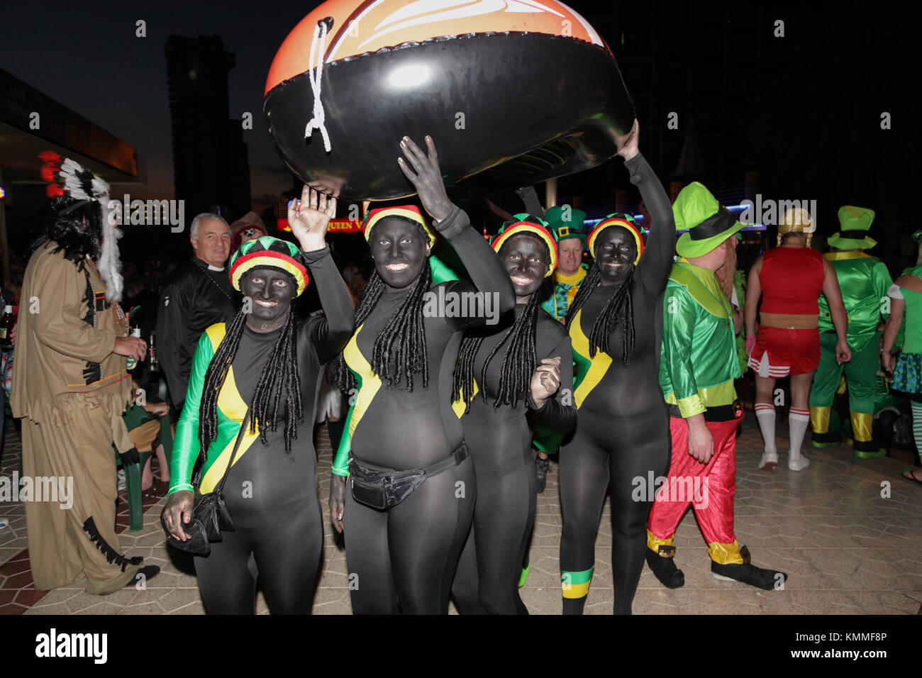 Benidorm new town British fancy dress day group of women dressed as jamaican bobsleigh team Stock Photo