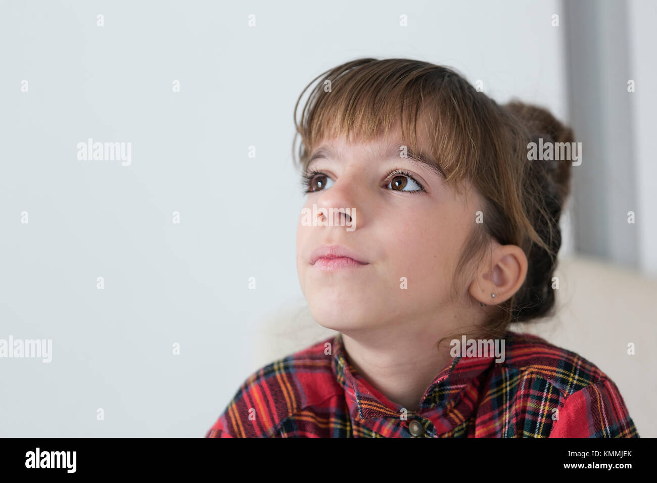10 Year Old Girl Serious And Thoughtful Horizontal Shot Stock Photo 10-year-old-girl-serious-and-thoughtful-horizontal-shot-stock-photo