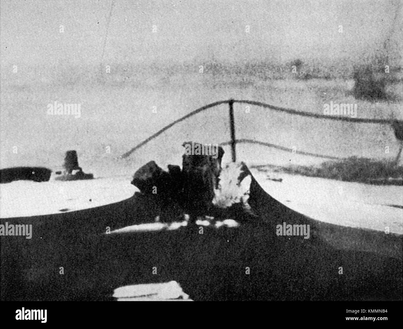 HMS Lion, a British battlecruiser, sustained significant shell damage to its Q turret roof during the Battle of Jutland in 1916. This image from 'Warships To-day' (1936) showcases the extent of the damage and highlights the ship’s role in naval warfare during World War I. Stock Photo