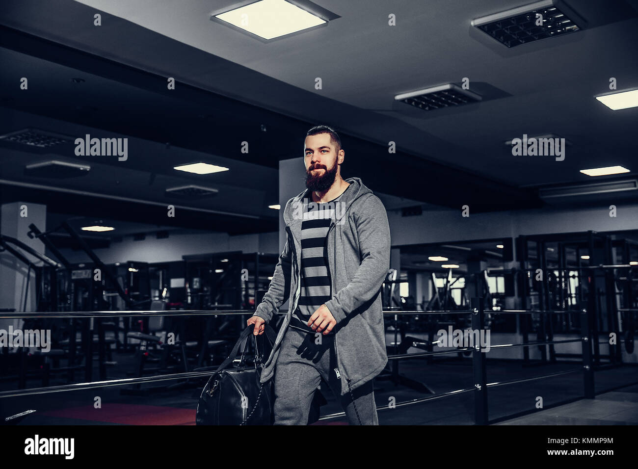 Confident young sportsmen leaving gym Stock Photo