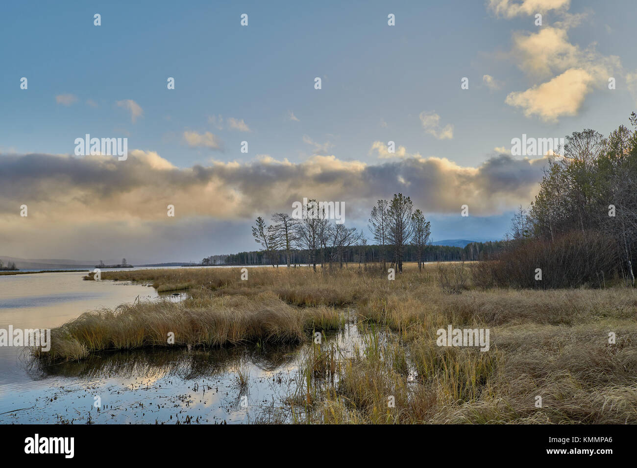 Sunset in the autumn forest by the lake in the mountains Stock Photo ...