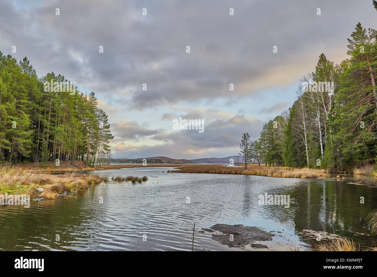 Sunset in the autumn forest by the lake in the mountains Stock Photo ...