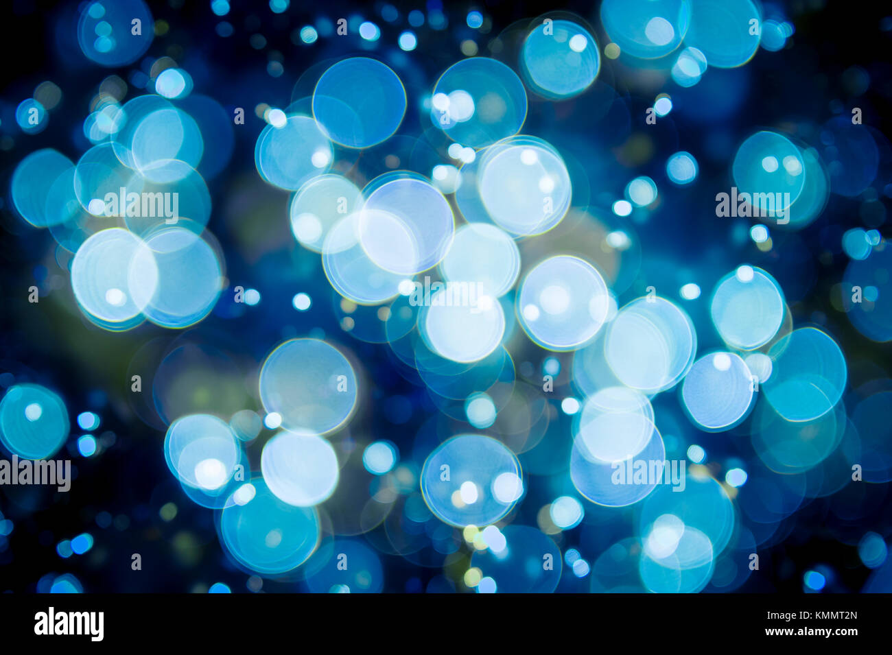Winter holiday background in an abstract defocus ice blue bokeh Stock Photo
