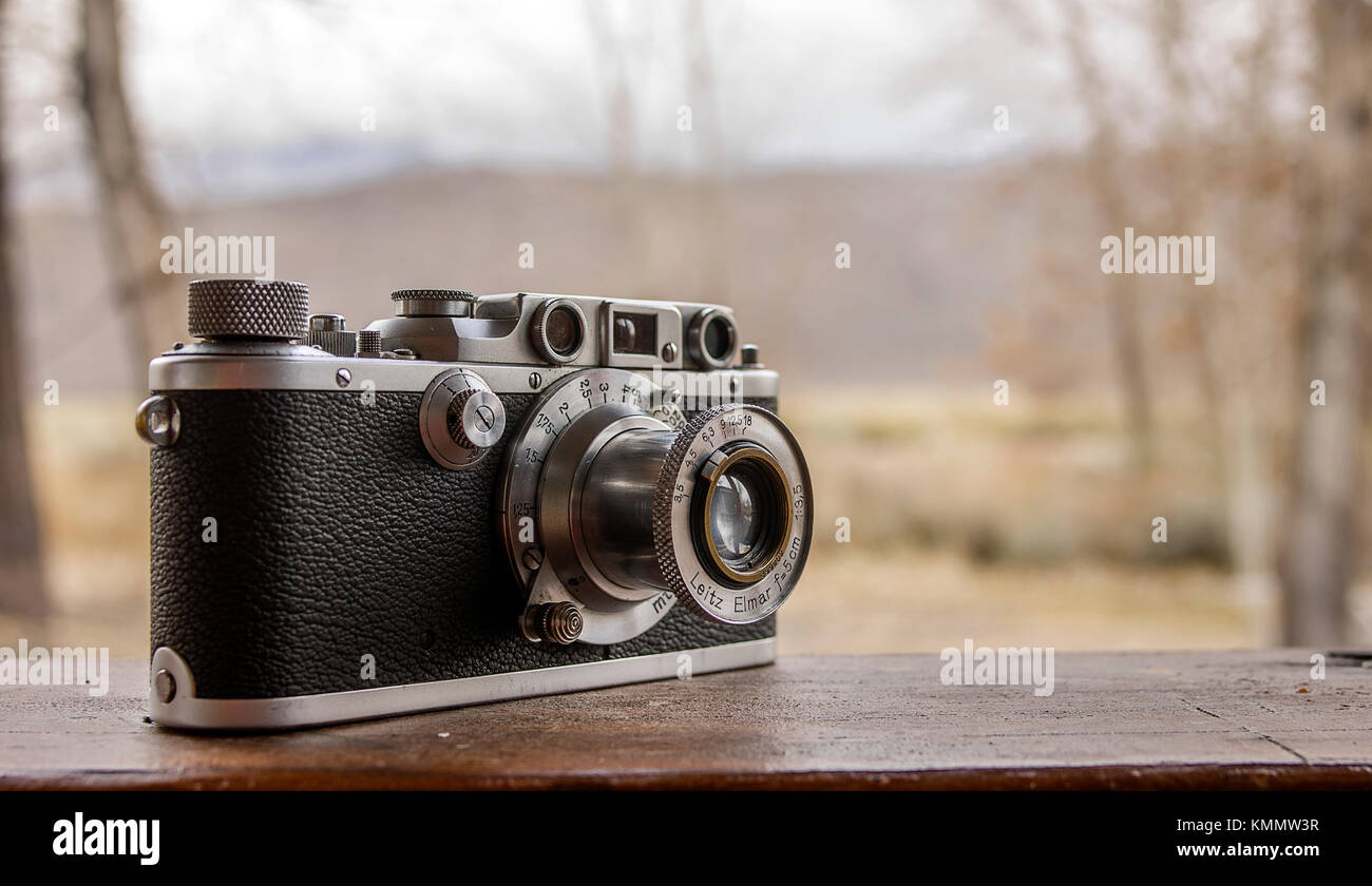 Leitz Leica iiib Classic Vintage Rangefinder 35mm Film Camera and Autumn Forest and Field Stock Photo