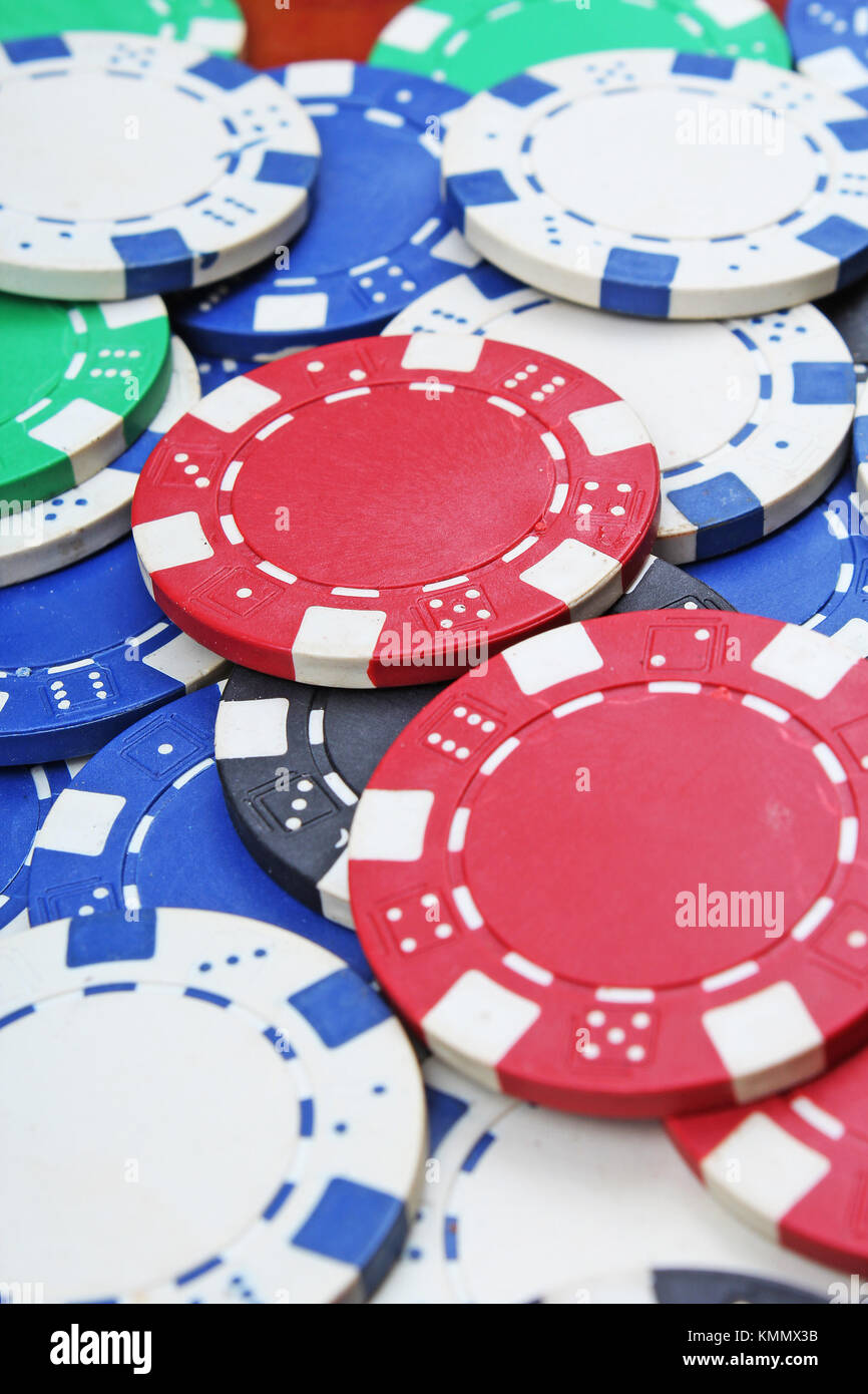 Casino poker money chips texture. Stack of poker chips as background. Poker casino token tokens as background. Stock Photo
