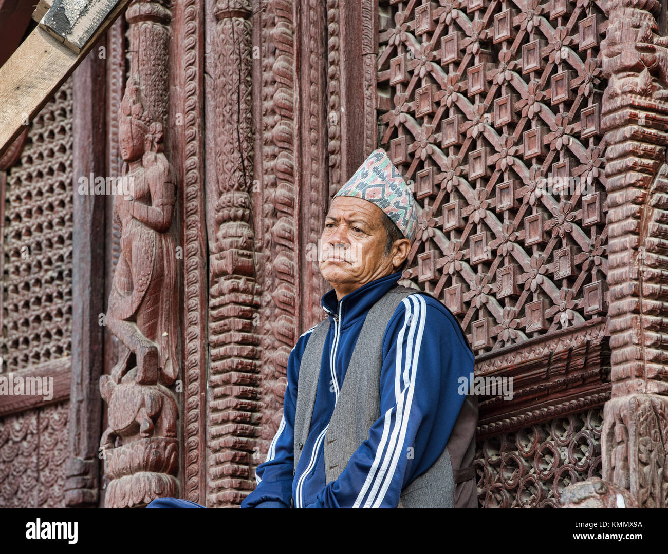 Sitting in reflection at a temple in Durbar Square, Kathmandu, Nepal Stock Photo