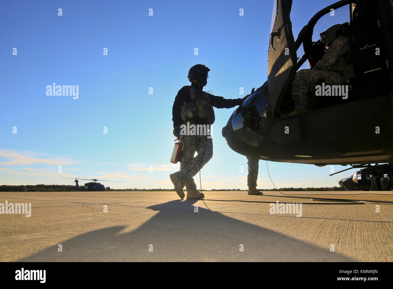 U.S. Army Sgt. Jeff Angle, a UH-60 Black Hawk crew chief with the New ...