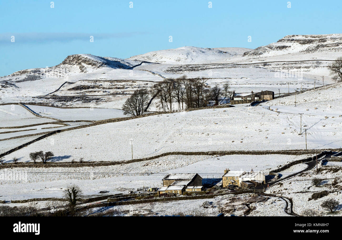 The scene near Ribblehead in Yorkshire, as parts of Britain woke up to a blanket of snow caused by an Arctic airflow in the wake of Storm Caroline. Stock Photo