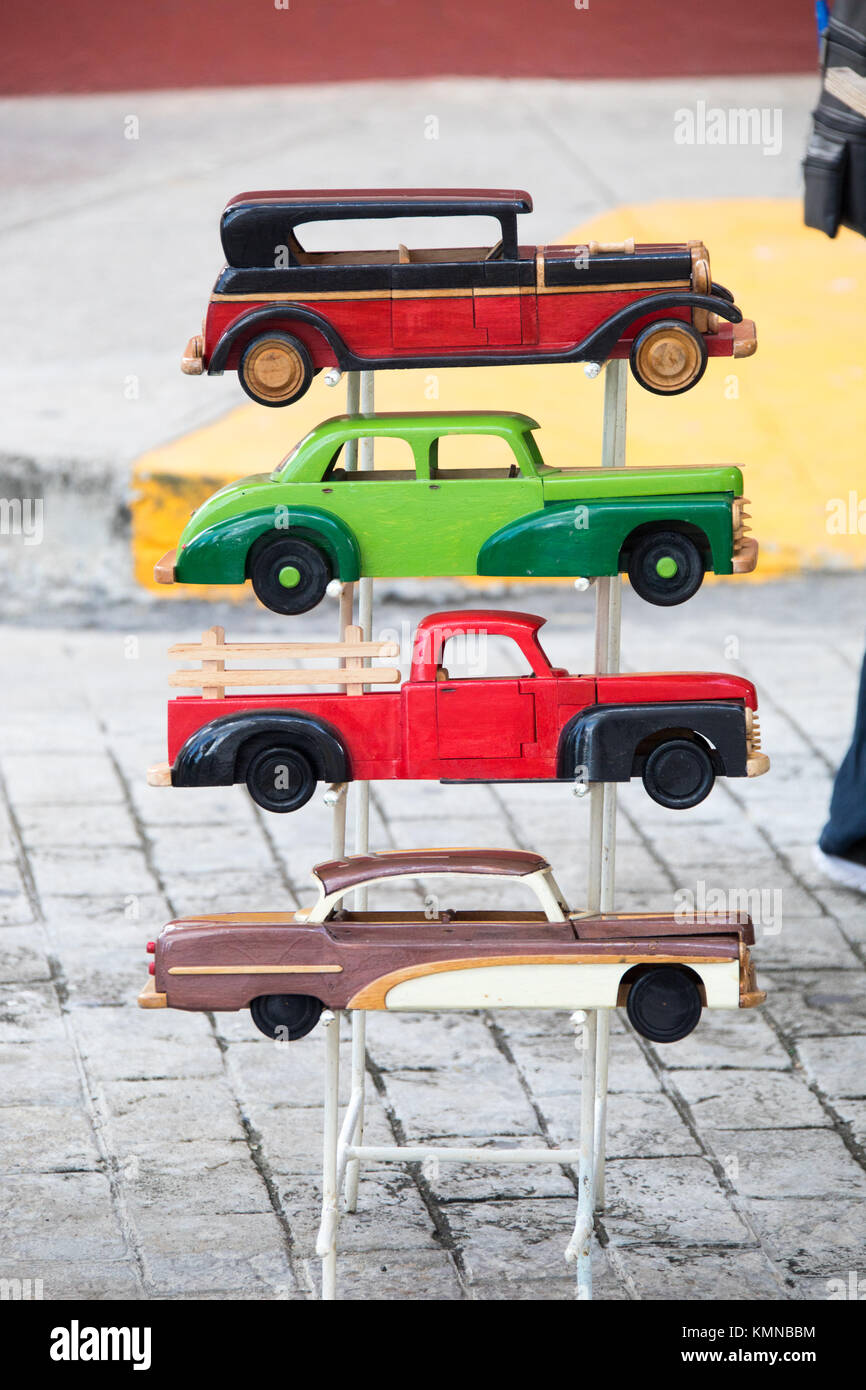 Carved antique wooden cars, Cienfuegos, Cuba Stock Photo