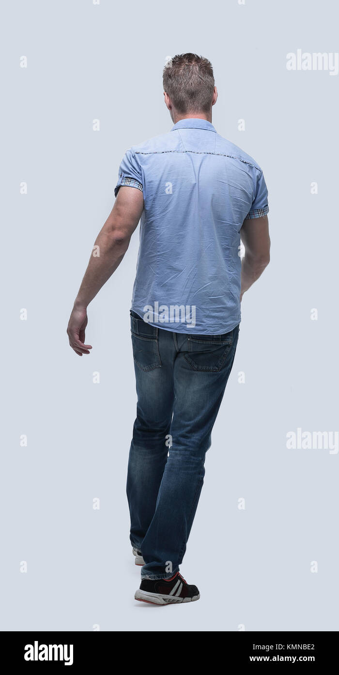 in full growth.rear view.a successful man goes ahead Stock Photo - Alamy