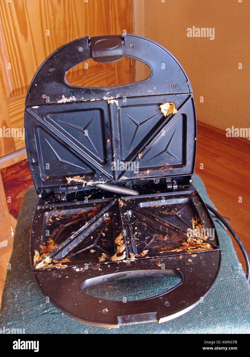 Dirty toaster unwashed after baking close up Stock Photo Alamy