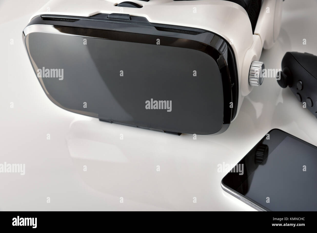 Black and white virtual reality glasses close up with smartphone on ...