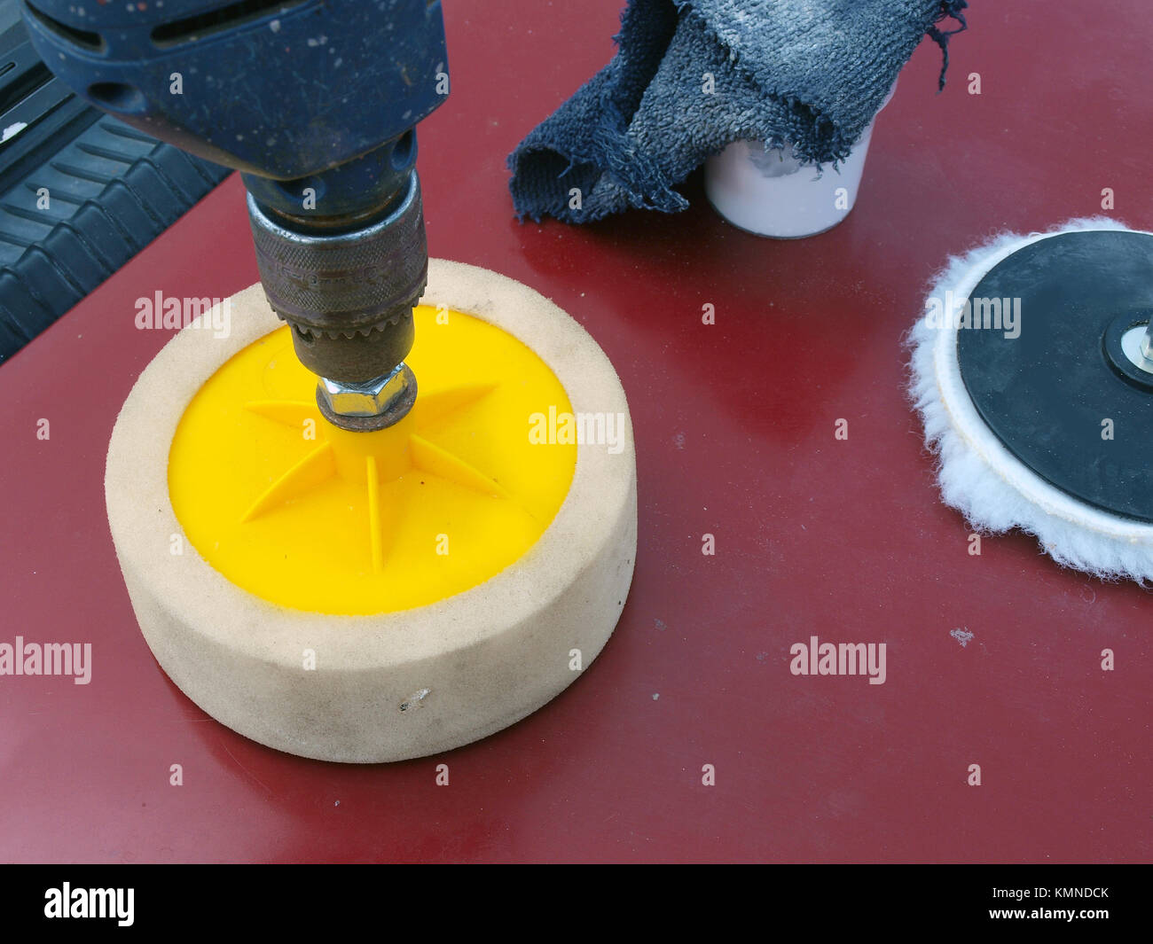 Polishing car body painting by foam rubber disk and electric drill