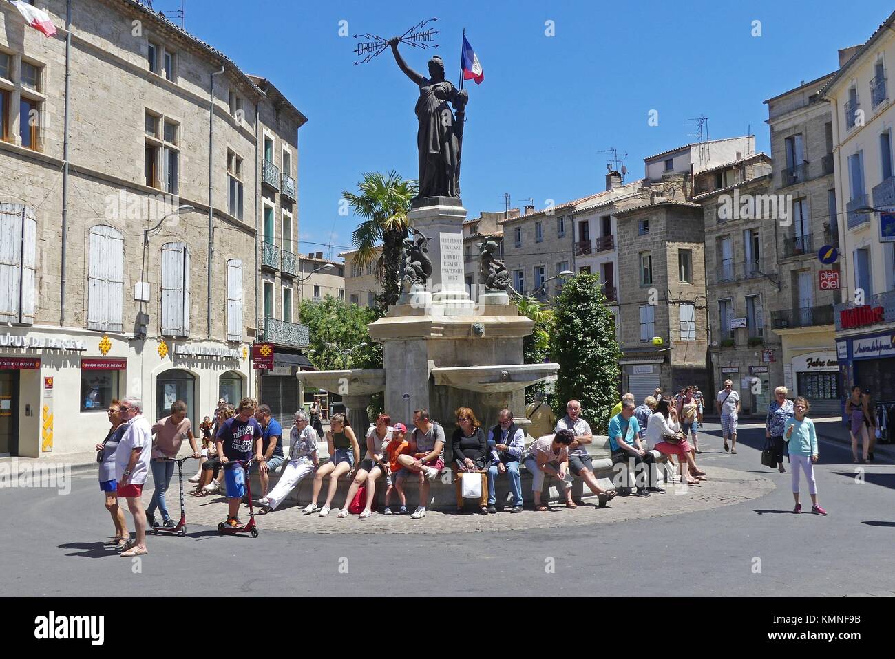 Tourists taking a break, Pezenas, France Stock Photo