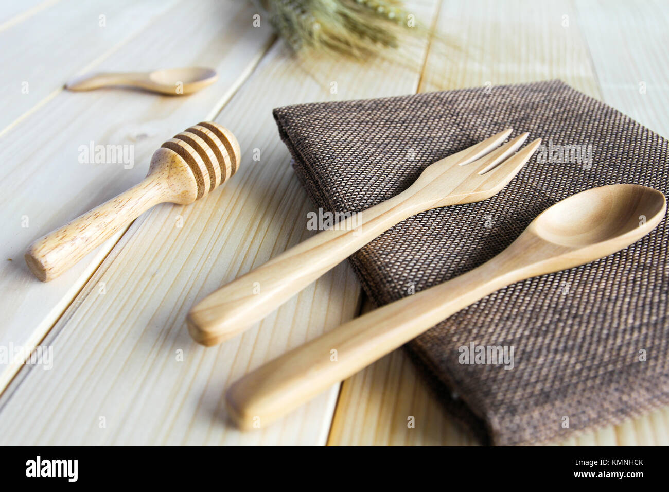 Wooden kitchen utensils on wooden background Stock Photo - Alamy