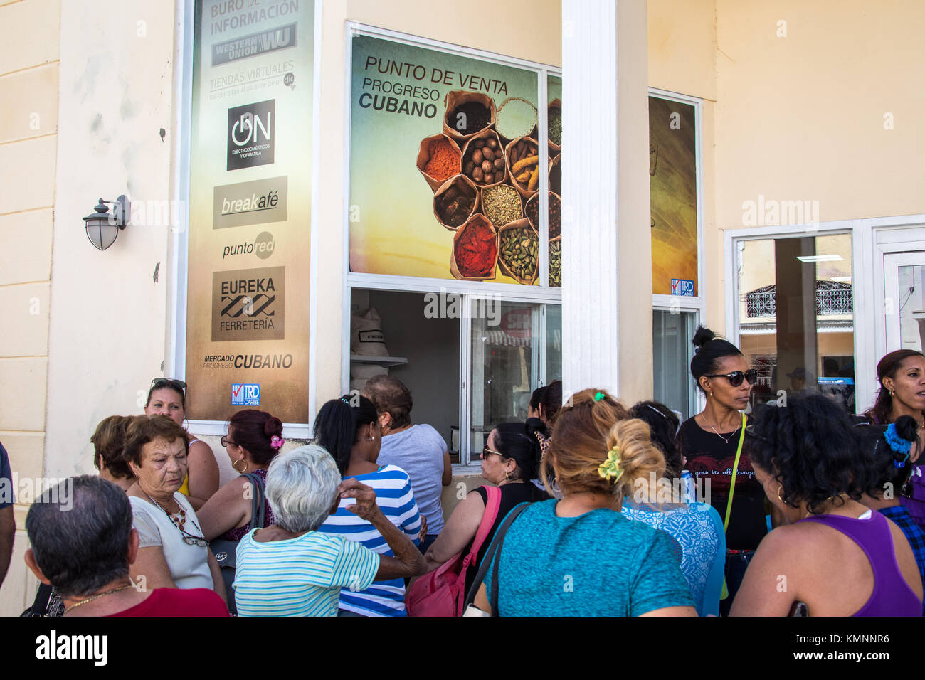 People waiting in line for a limited supply of rice in Cienfuegos, Cuba Stock Photo
