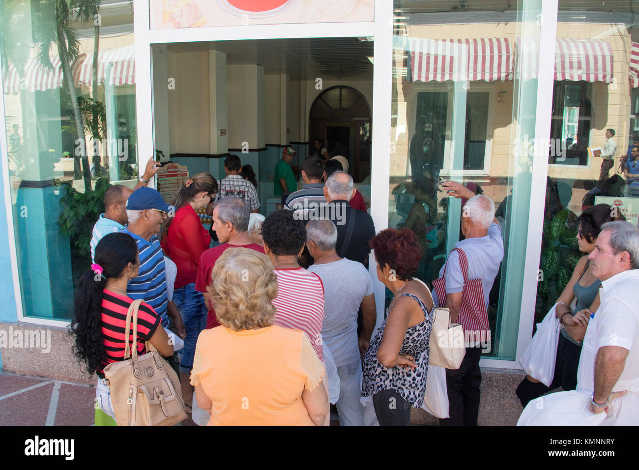 Waiting in line for a limited supply of eggs, Cienfuegos, Cuba Stock Photo