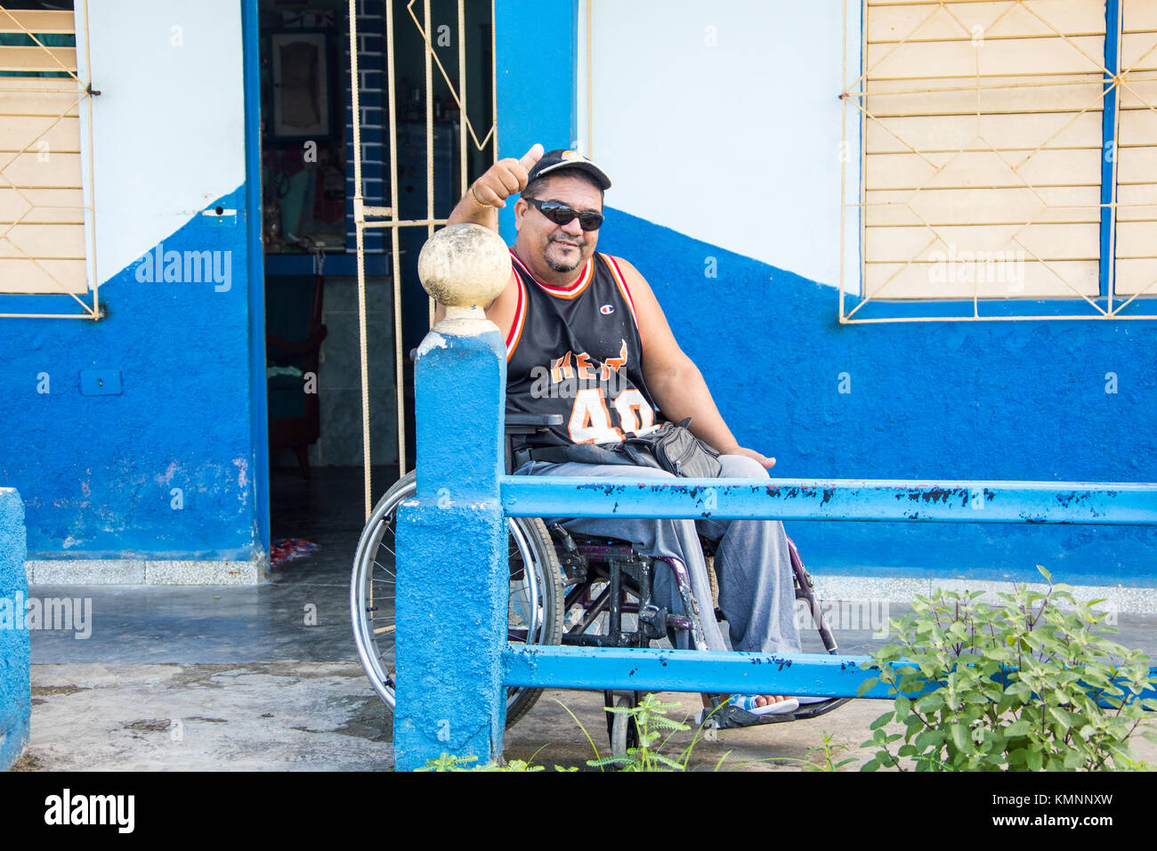 Local man in a wheelchair, Cienfuegos, Cuba Stock Photo