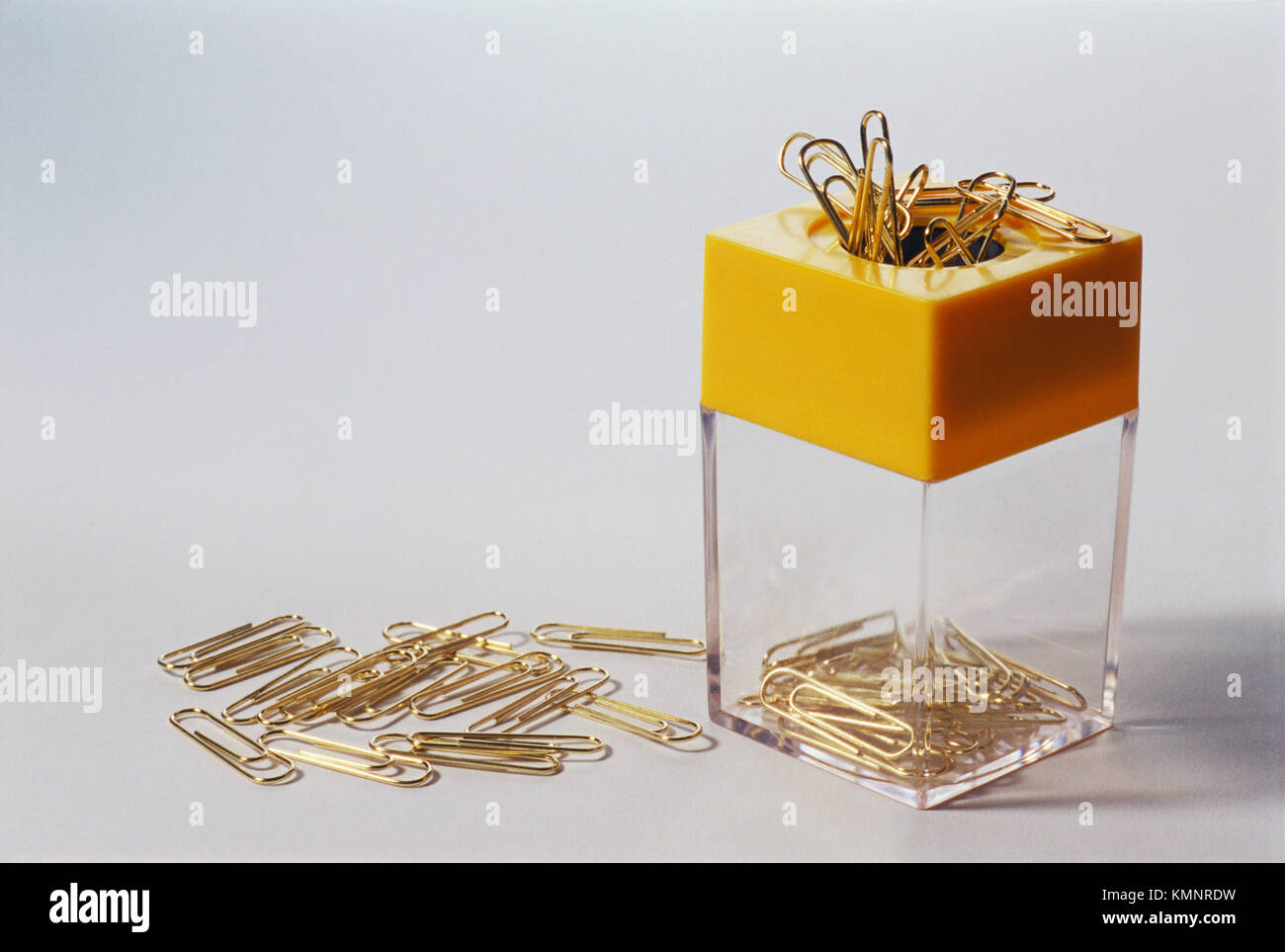 paperclip container and paperclips Stock Photo Alamy