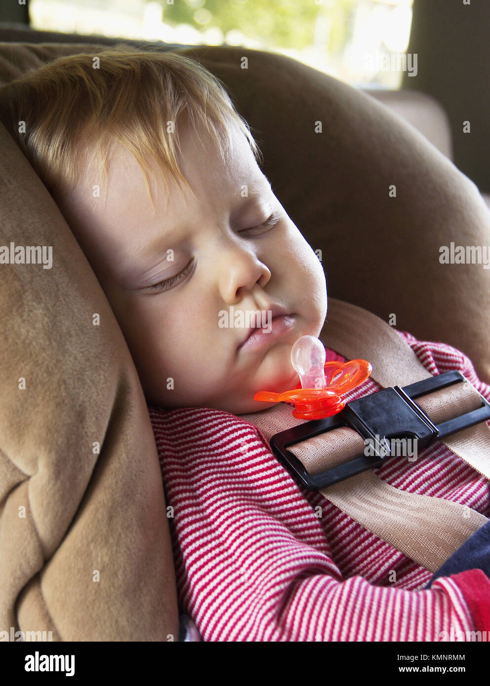 sleeping baby in car seat Stock Photo Alamy